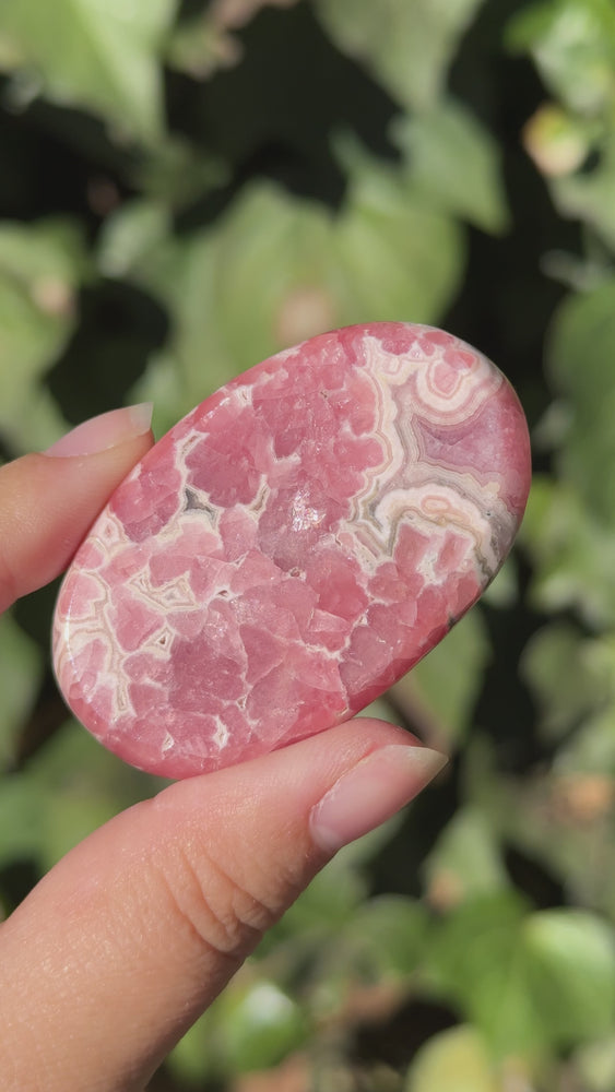 
                  
                    Load and play video in Gallery viewer, Rhodochrosite Palm Stone
                  
                